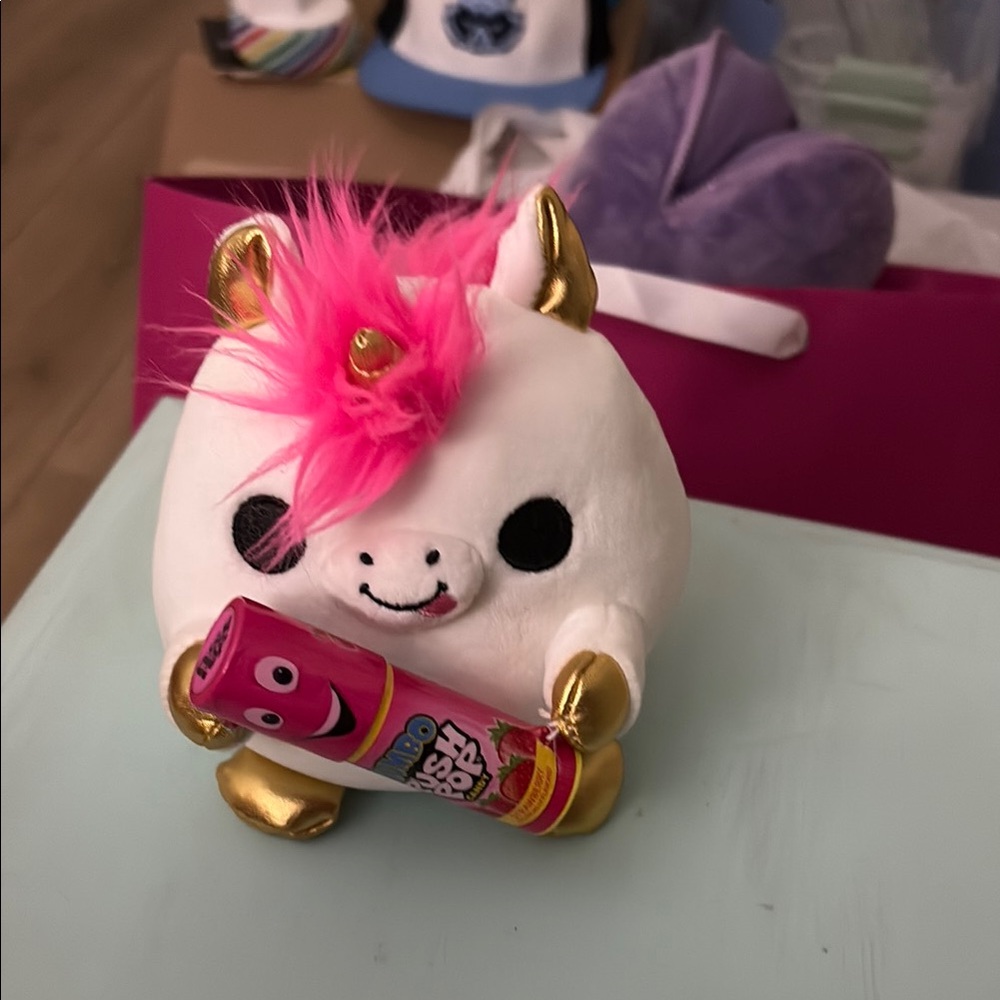 Pink and Gold Stuffed Animal with Roller Skates